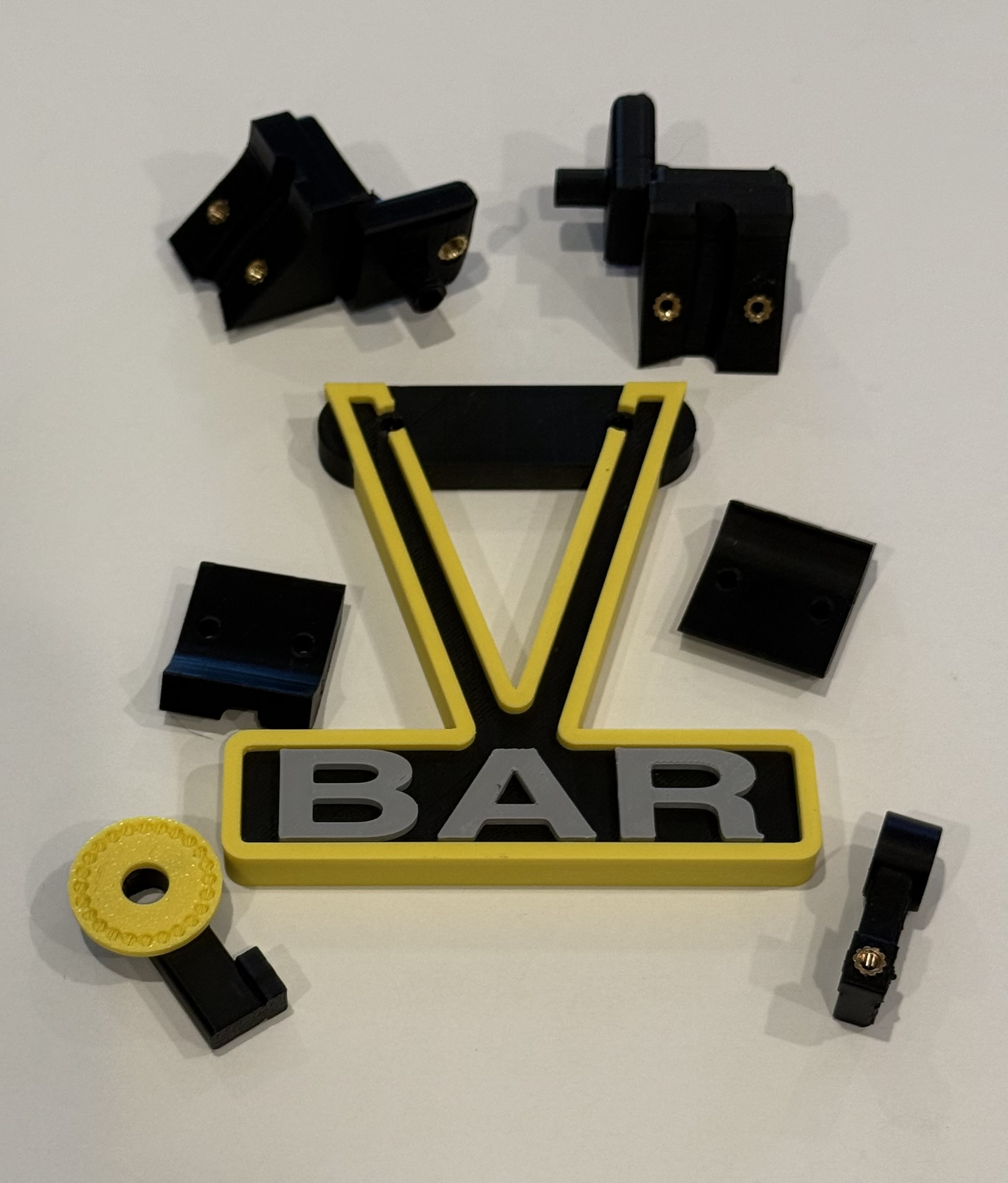 VBar stand printed components arranged before assembly